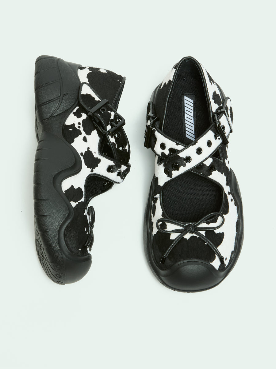 ANYA COW PRINT PONY