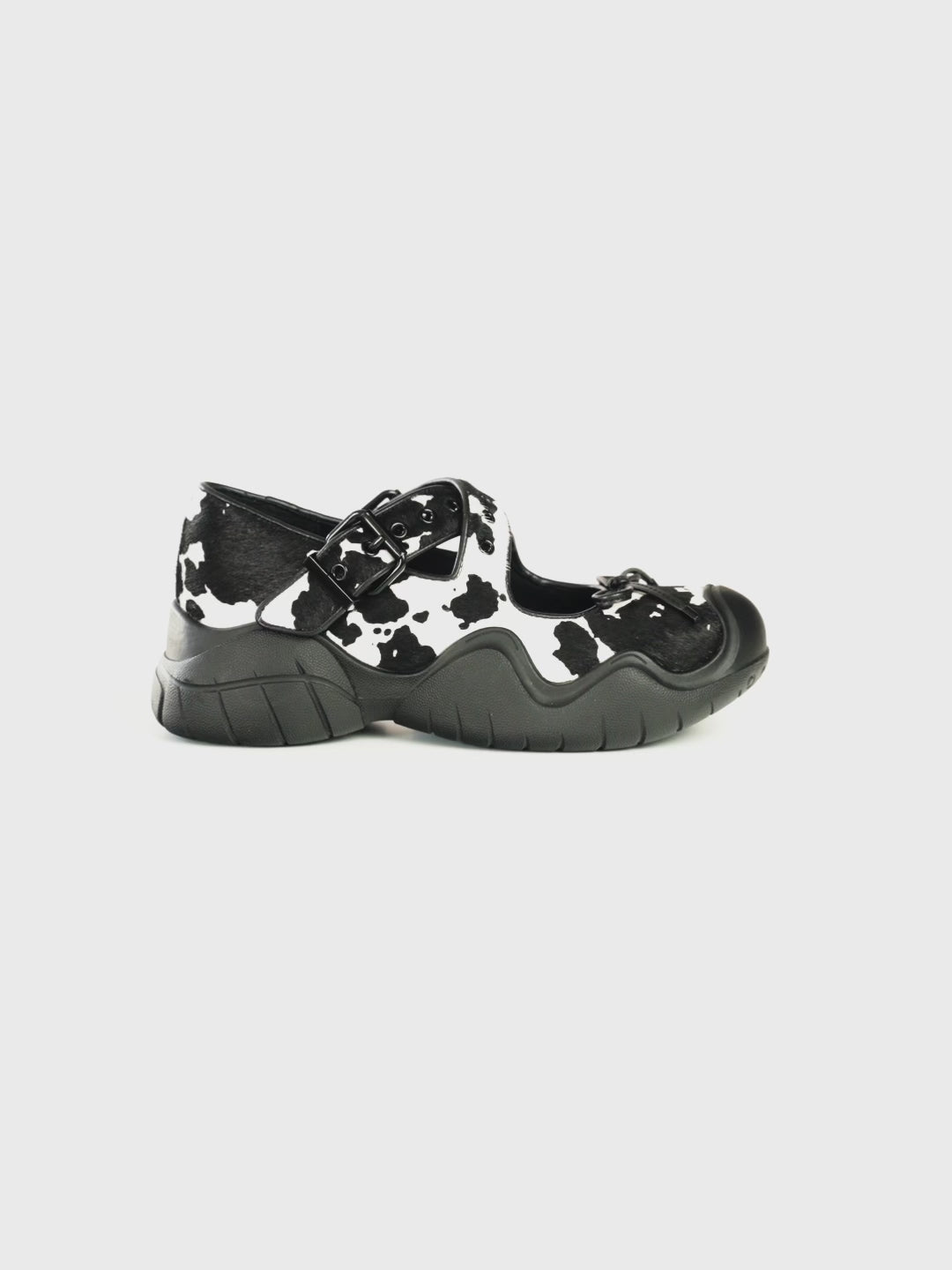 ANYA COW PRINT PONY