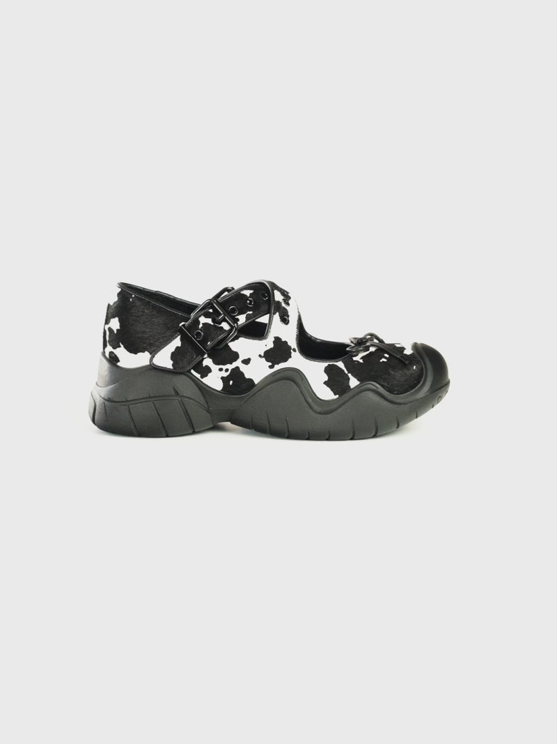 ANYA COW PRINT PONY